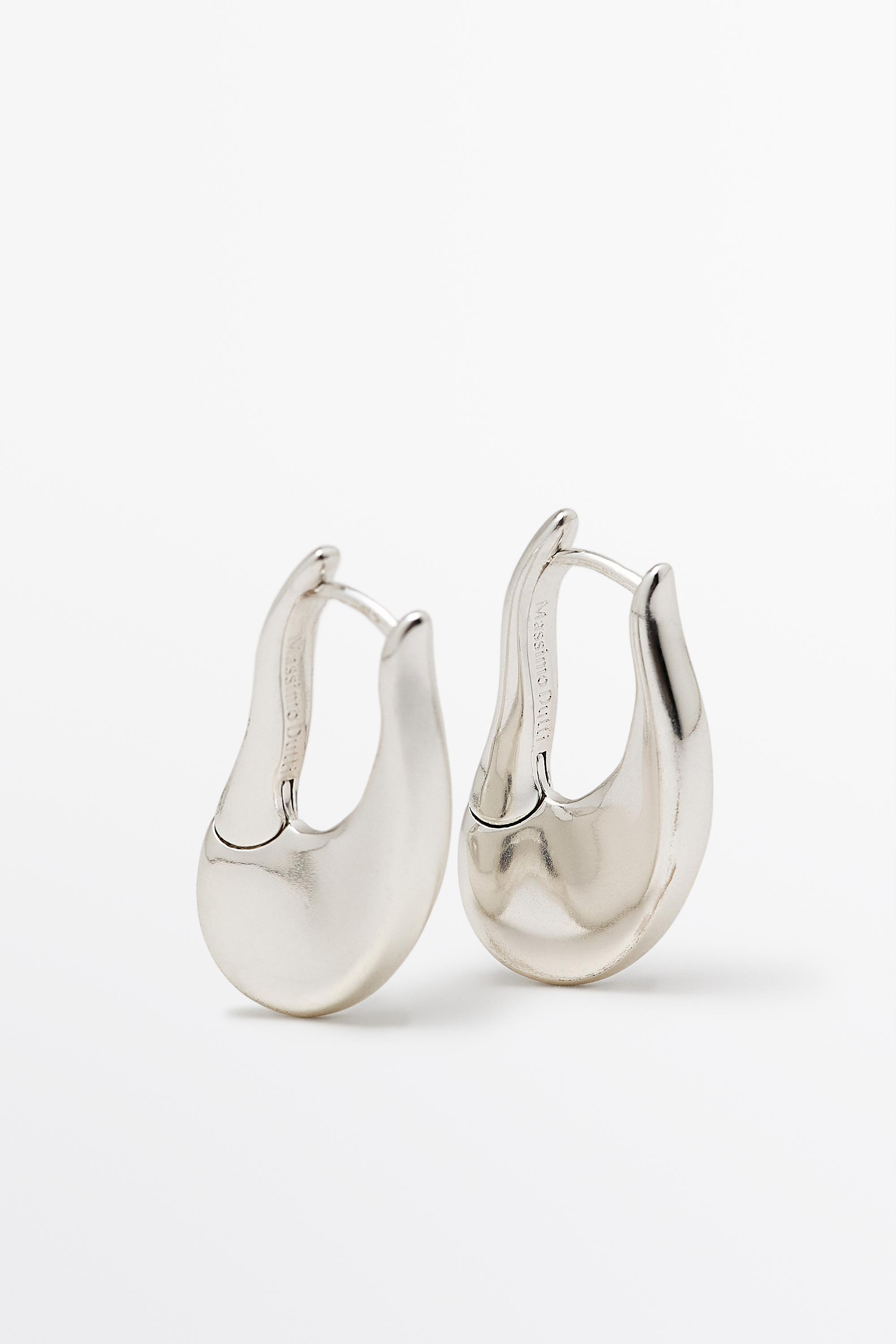 Boucles d’oreilles créoles lignes fluides